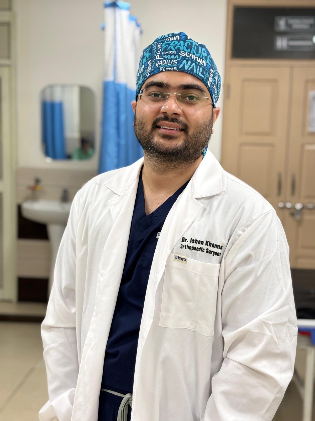 Dr. Ishan Khanna in the clinic consultation room