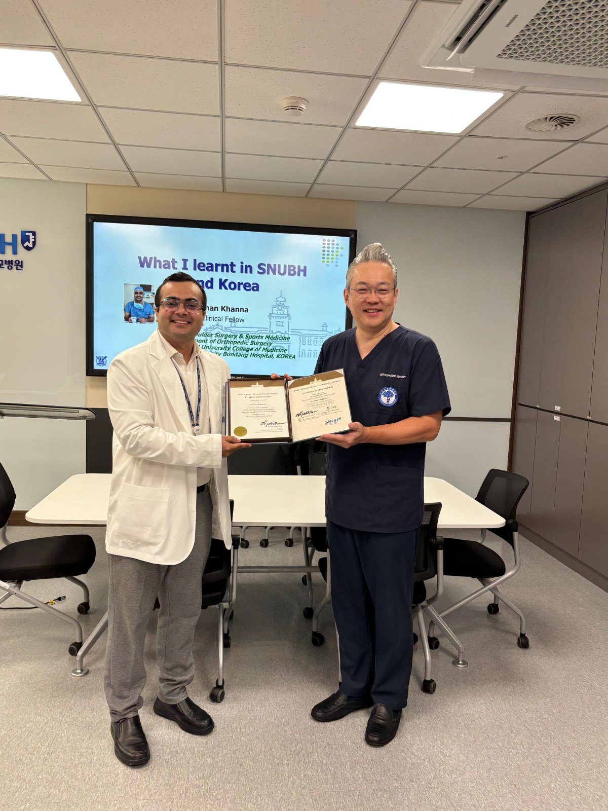 Dr. Ishan Khanna receiving his shoulder surgery fellowship certificate at Seoul National University Bundang Hospital, South Korea